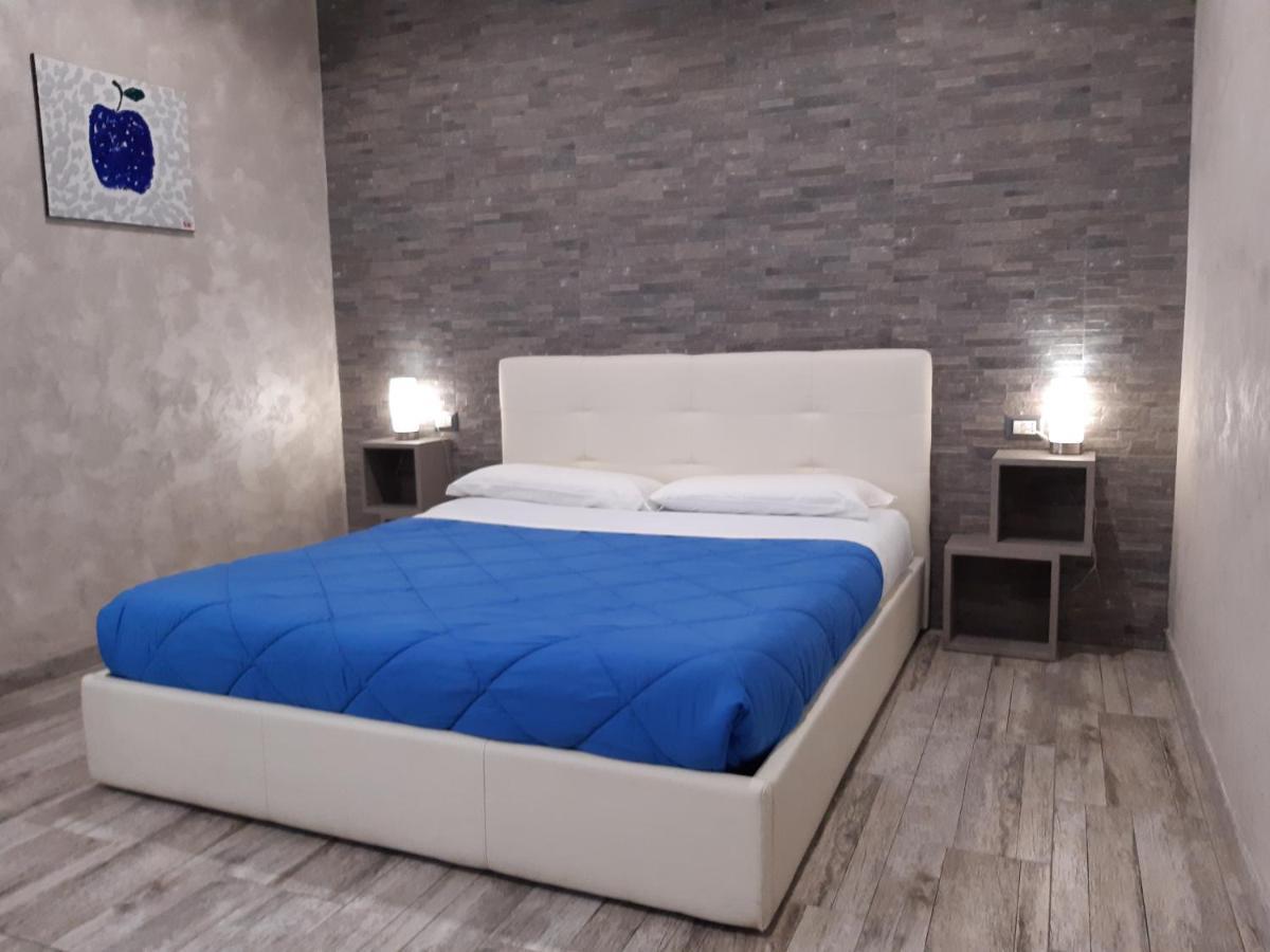 Apple Rooms Rome Airport Fiumicino Exteriér fotografie A bedroom